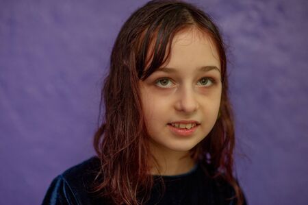 portrait of a little girl. Girl 9 years old. Representatives of the Alpha generation are much less...