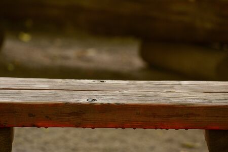 Wooden swing in the park. empty wooden swing in children playground.の写真素材