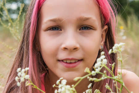 cute child girl portrait . Outdoor portrait of cute little girl in summer day. Portrait of a little...