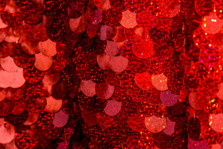 Red sequins pattern. Sparkling sequins background. Red sequin fabric for background. rectangular red...