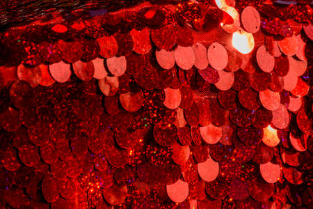 Red sequins pattern. Sparkling sequins background. Red sequin fabric for background. rectangular red...