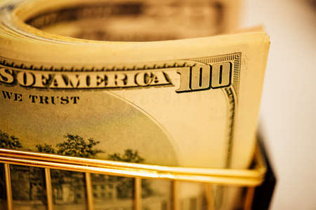Financial concept, bank notes in the shopping cart. shopping cart with dollars banknotes. financial...