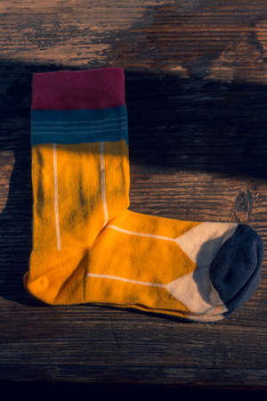 Socks colorful. Set of socks. On wood background. Hey Lesia,の写真素材