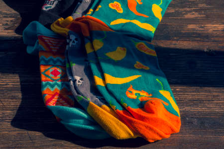 Socks colorful. Set of socks. On wood background. Hey Lesia,の写真素材
