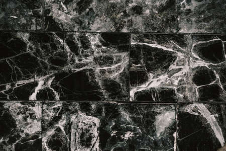 Marble Pattern. Close-up of marble tile. Black marble patterned texture background. Marble for...