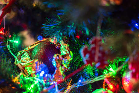 Merry Christmas and Happy New Year. Christmas toys on the tree. Christmasの写真素材