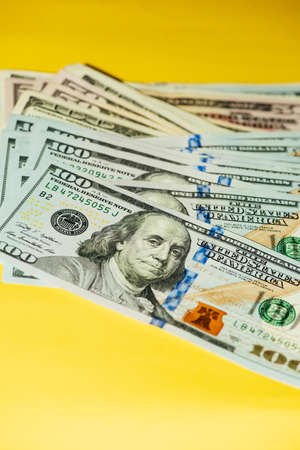 Dollars different bills. Dollars background. Background of different us dollar banknotes. Finance...