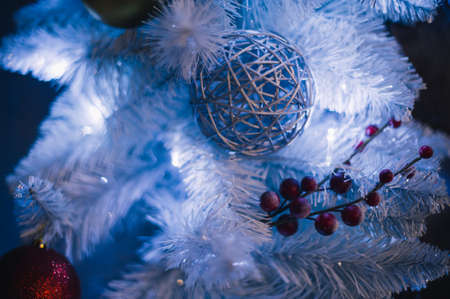 Merry Christmas and Happy New Year. Christmas toys on the tree. Christmasの写真素材