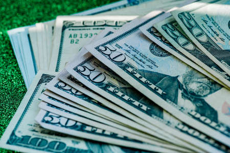 dollars background. Dollars background. Background of different us dollar banknotes. Finance...