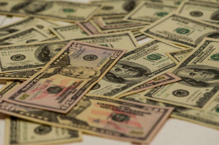 dollars background. Dollars background. Background of different us dollar banknotes. Finance concept. Dollars different bills.の写真素材