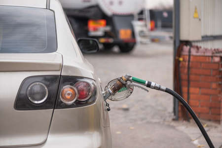 The car will be fueled with gas. Fueled with gas. Gas station, transportの写真素材