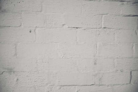 White brick wall background. white brick interior facade wall. old cement grunge backgroundの写真素材