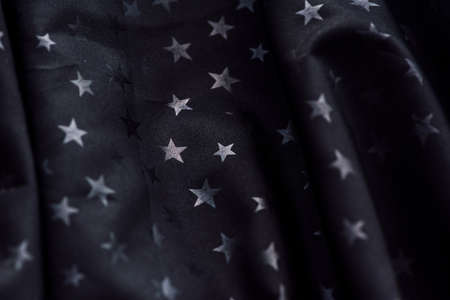 Black background with stars. Black fabric with stars. the clothの写真素材