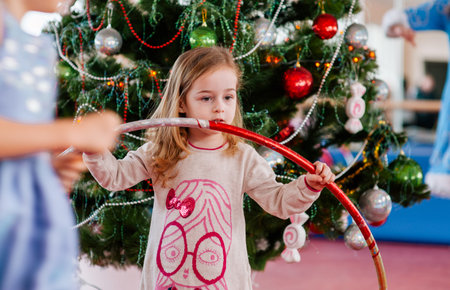 Merry Christmas and Happy New Year. little girl. Little girl on new year. Children's Christmas Partyの写真素材