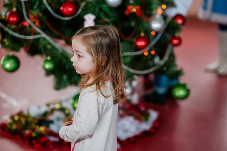 Merry Christmas and Happy New Year. little girl. Little girl on new year. Children's Christmas Partyの写真素材