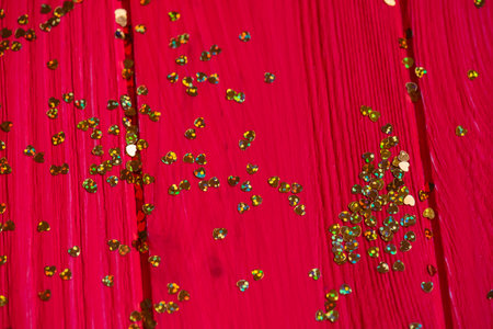 Gold and red. Abstract gold and red background. Golden shiny background. Gold glitter sparklesの写真素材