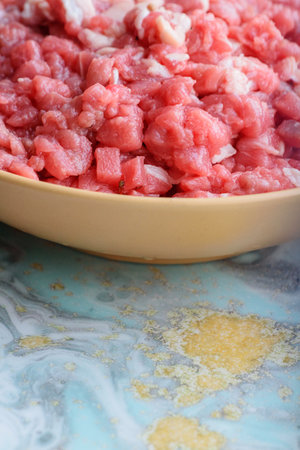 Organic raw minced meat. Minced meat for burgers or cutlets. Chopped meat in a meat grinder