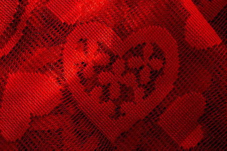 Background textile. Openwork fabric with red hearts. Loveの写真素材