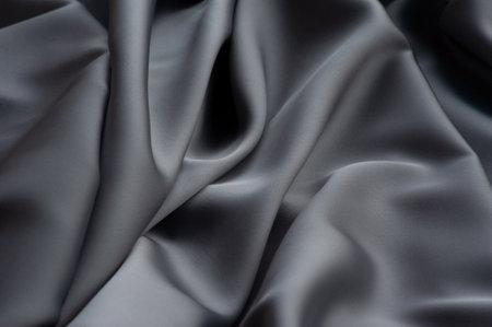 gray silk fabric.This satin fabric is perfect for making fabric Texture, background, pattern. grayの写真素材