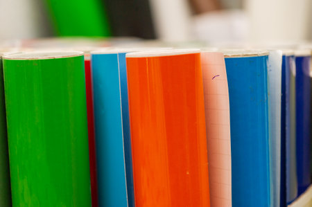 colored vinyl car wrapping or plotter cutting sticker foil film rolls. Film in rolls for advertisingの写真素材