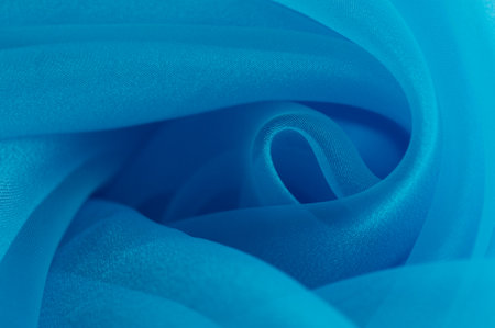 light blue texture used as background. Blue light fabric texture. Close-up blue synthetic fur textureの写真素材