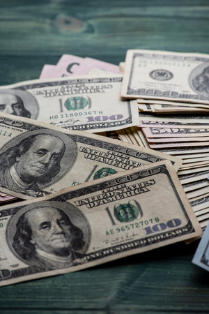Dollars bills. Dollars background. Background of different us dollar banknotes. Finance concept.