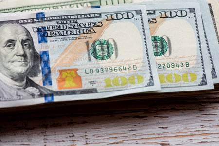 Dollars bills. Dollars background. Background of different us dollar banknotes. Finance concept.