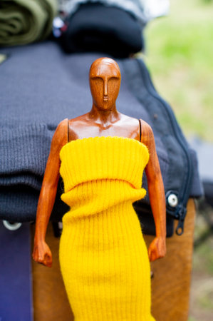 Knitting dress on mannequin. Mannequins in knitted clothes. clothing fashion doll styleの写真素材
