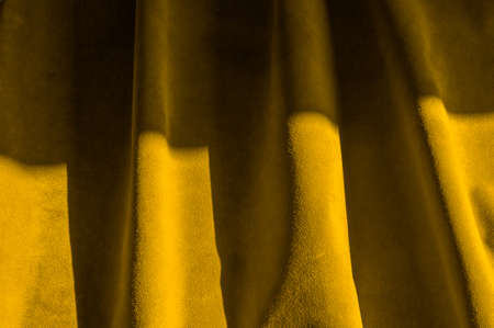 Velvet texture of seamless leather. Felt material macro. Yellow suede. leatherの写真素材