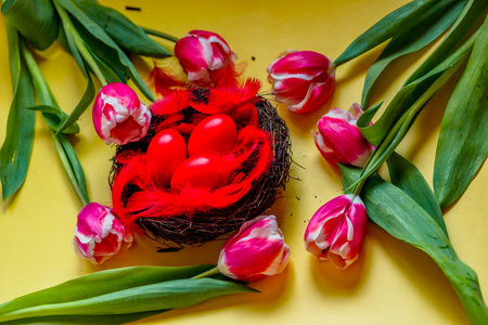 Bouquet of tulips and as a background for post card. holiday. Painted red eggs. Happy Easter