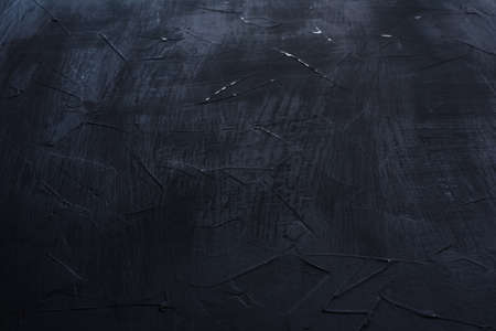 Dark grunge textured wall closeup. Black cement texture. background texture textured cementの写真素材