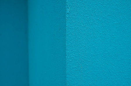 photo of a blue painted wall. Turquoise or blue wall background. turquoise, backgroundの写真素材