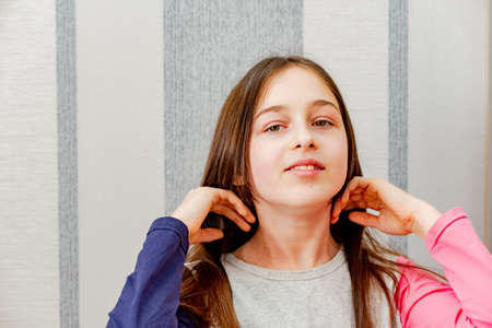 Happy Girl Getting her Hair Cut. A series of photos of a girl getting her hair cut. haircut, girl,の写真素材