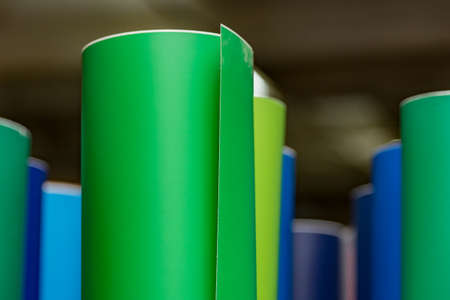 colored vinyl car wrapping or plotter cutting sticker film rolls. Film in rolls for advertisingの写真素材