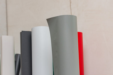 colored vinyl car wrapping or plotter cutting sticker film rolls. Film in rolls for advertisingの写真素材