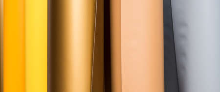 colored vinyl car wrapping or plotter cutting sticker film rolls. Film in rolls for advertisingの写真素材