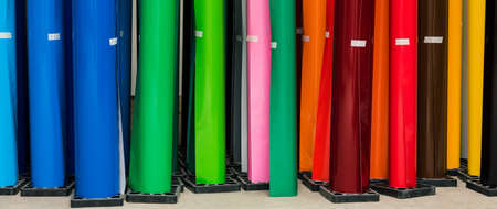 colored vinyl car wrapping or plotter cutting sticker film rolls. Film in rolls for advertisingの写真素材