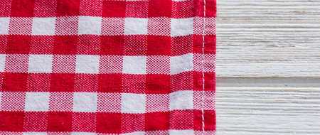 Red and white kitchen cotton fabric in a cage. fabric cotton texture checkered