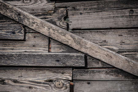 Dark grunge wood surface for background. Grunge Wood panels for backgroundの写真素材