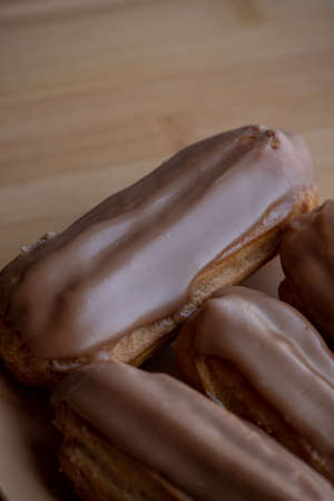 fatty sweet food. Cakes on a beige plate on the table. plate, snack, sugar