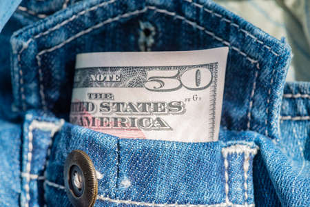 dollar banknotes. money in your pocket. paper money, currency, cash. close-up. finance, payments