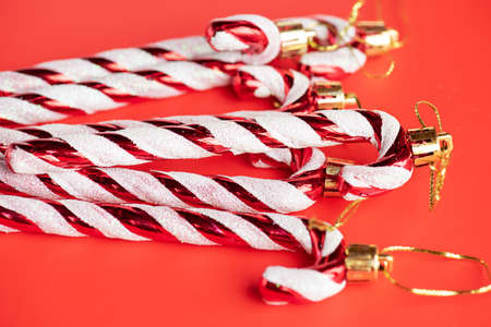 Christmas toy on a red background. Christmas composition, New Year's ornament.