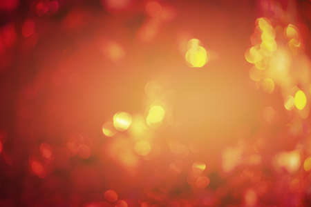 Glitter defocus. Red orange, yellow soft defocus light as a texture for designers.の写真素材