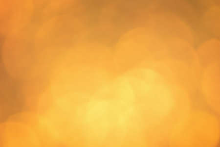 Glitter background. Defocus light golden color. Many round defocus lights.の写真素材