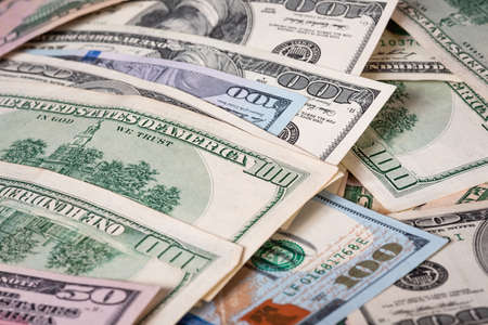 The concept of wealth. Background from money. A lot of money American paper banknotes.の写真素材