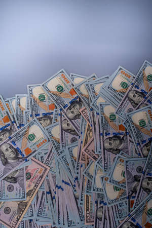 finance and business. American dollars on a gray background.