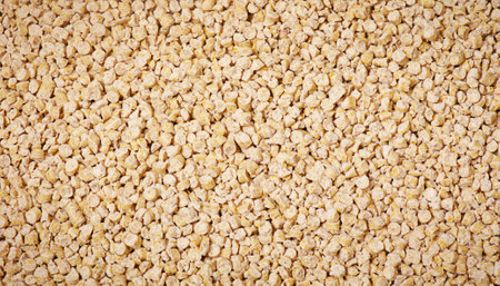 Corn filler hygienic for animals background. Ecological filler for the toilet of cats and rabbits.