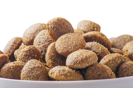 Food for dogs or cats. Dry pet food isolated on white background.