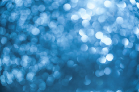 Glitter paper defocus as background. Sparkles defocus light. Blue.の写真素材