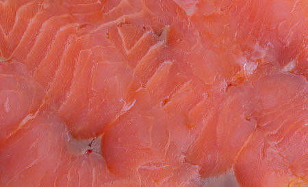 Red salmon fish as background macro photoの写真素材